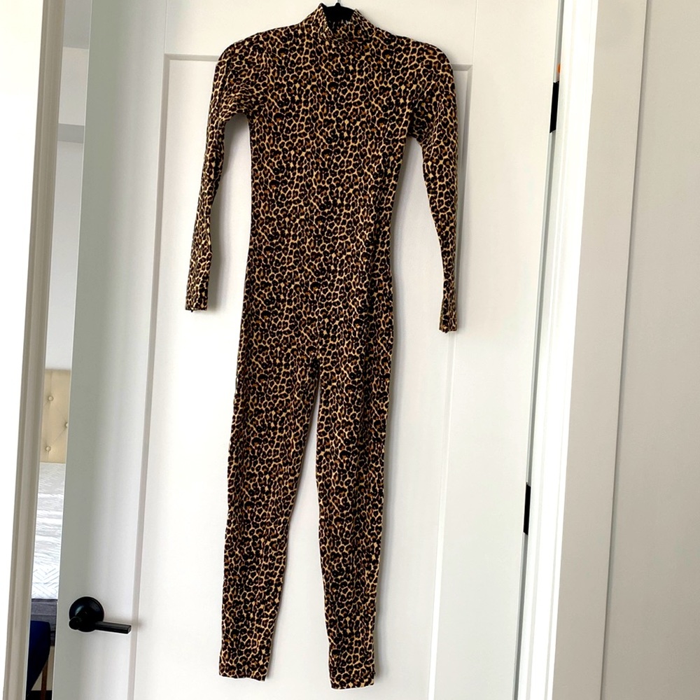 Fun leopard onesie from American Apparel. Worn once.
